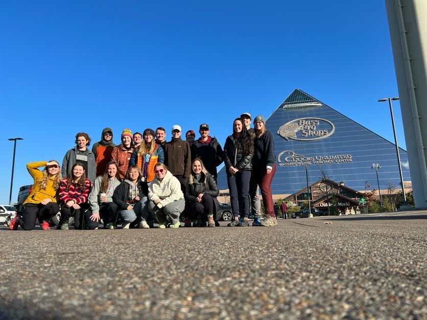 Students pose in front of a Bass Pro Shop on their way to Big Bend National Park in Texas.