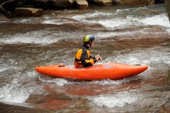 Kayaker in rapids
